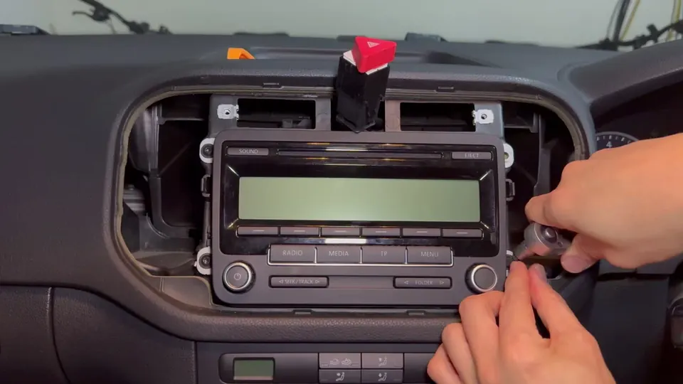 Removing the four head unit screws